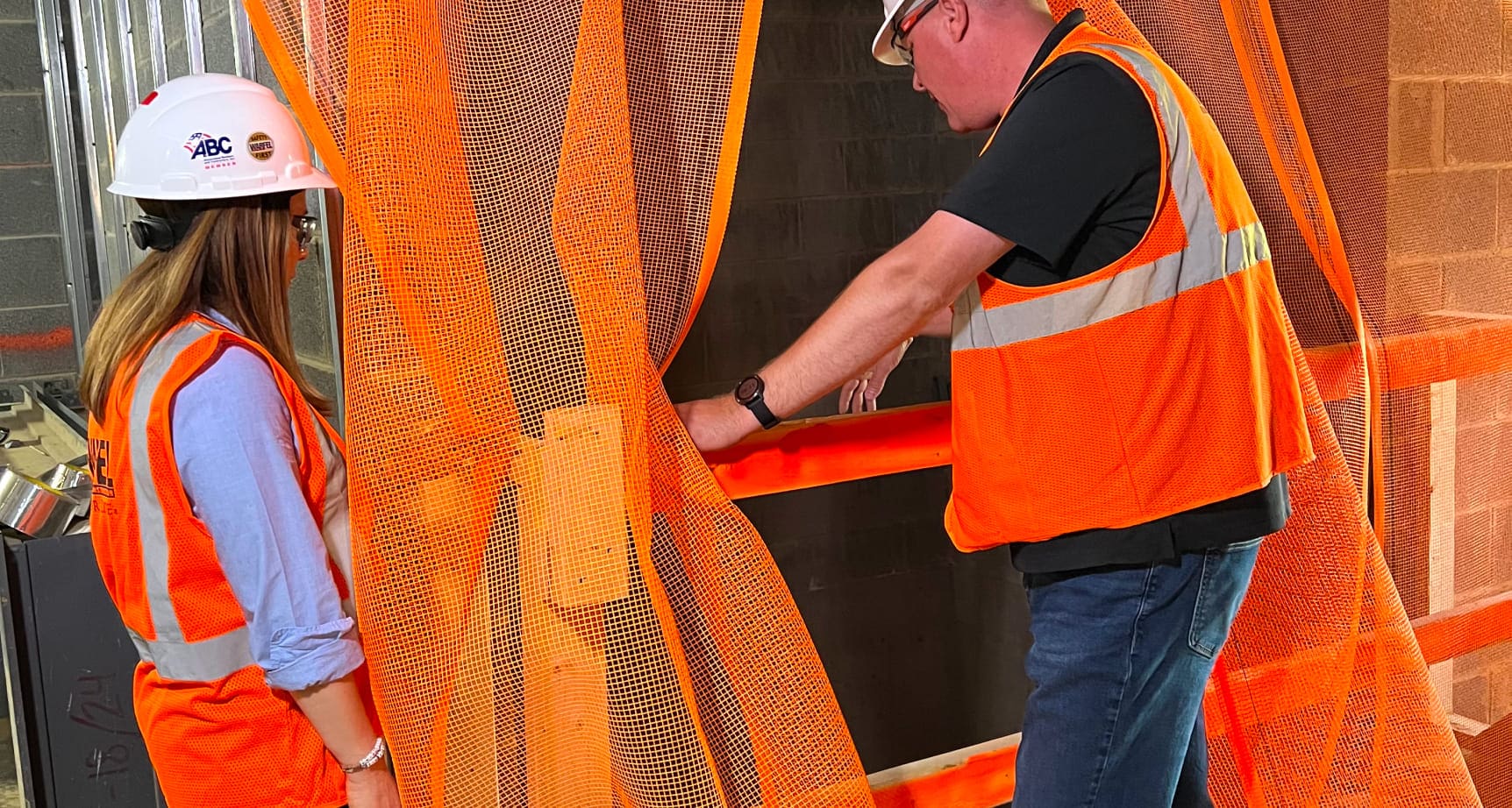 michelle g and steve d promoting safety on a job site